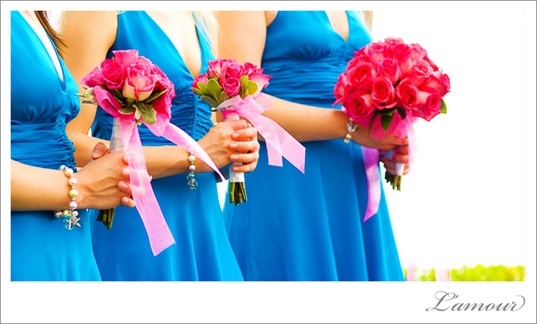 Bright contrasting colors make a bold statement on these destination wedding bridesmaids.