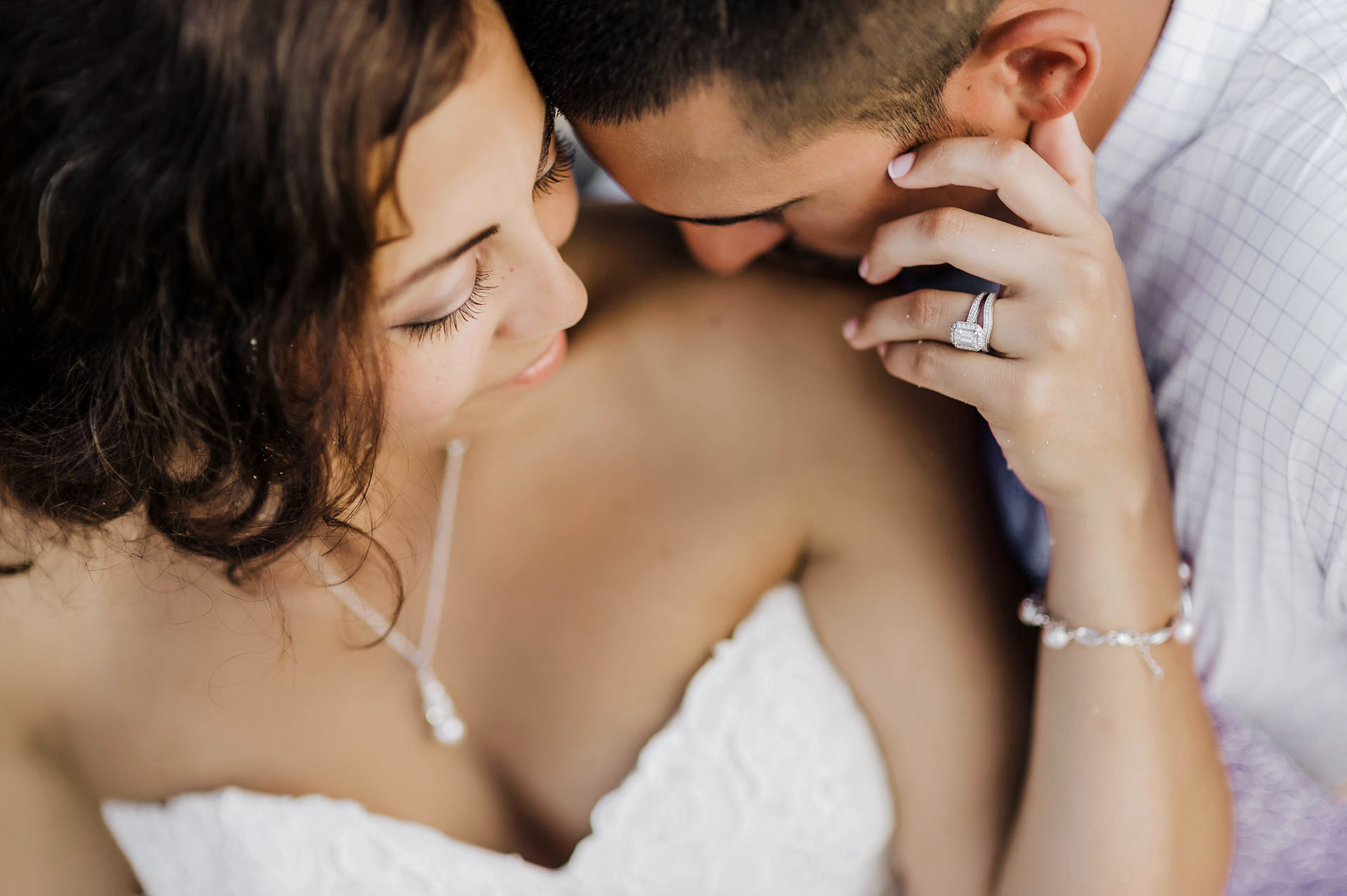 A couple holding each other close